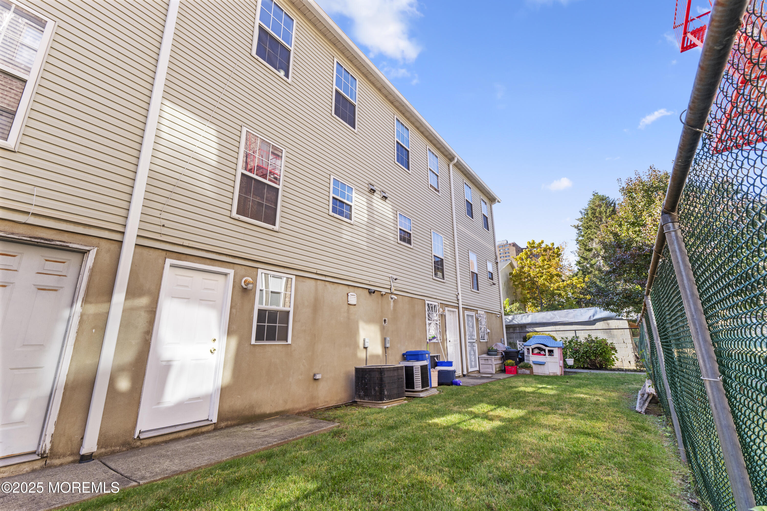 12 Carmella Court Newark, NJ 07104 - Photo 38 of 41 a view of a house with a yard