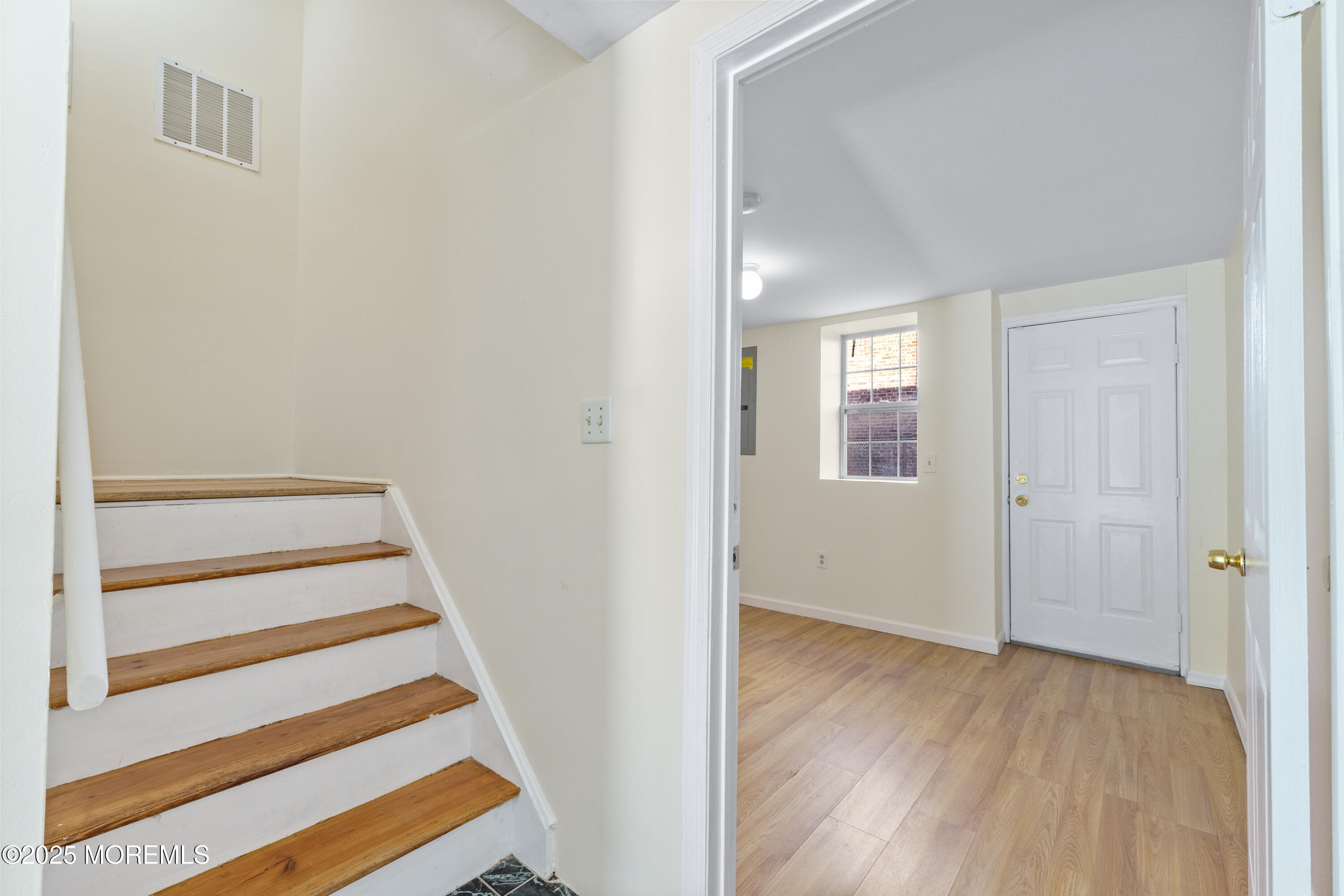 12 Carmella Court Newark, NJ 07104 - Photo 5 of 41 a view of entryway with wooden floor and a window