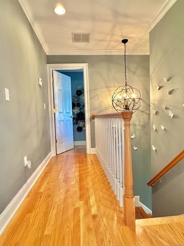 a very nice looking room with a chandelier