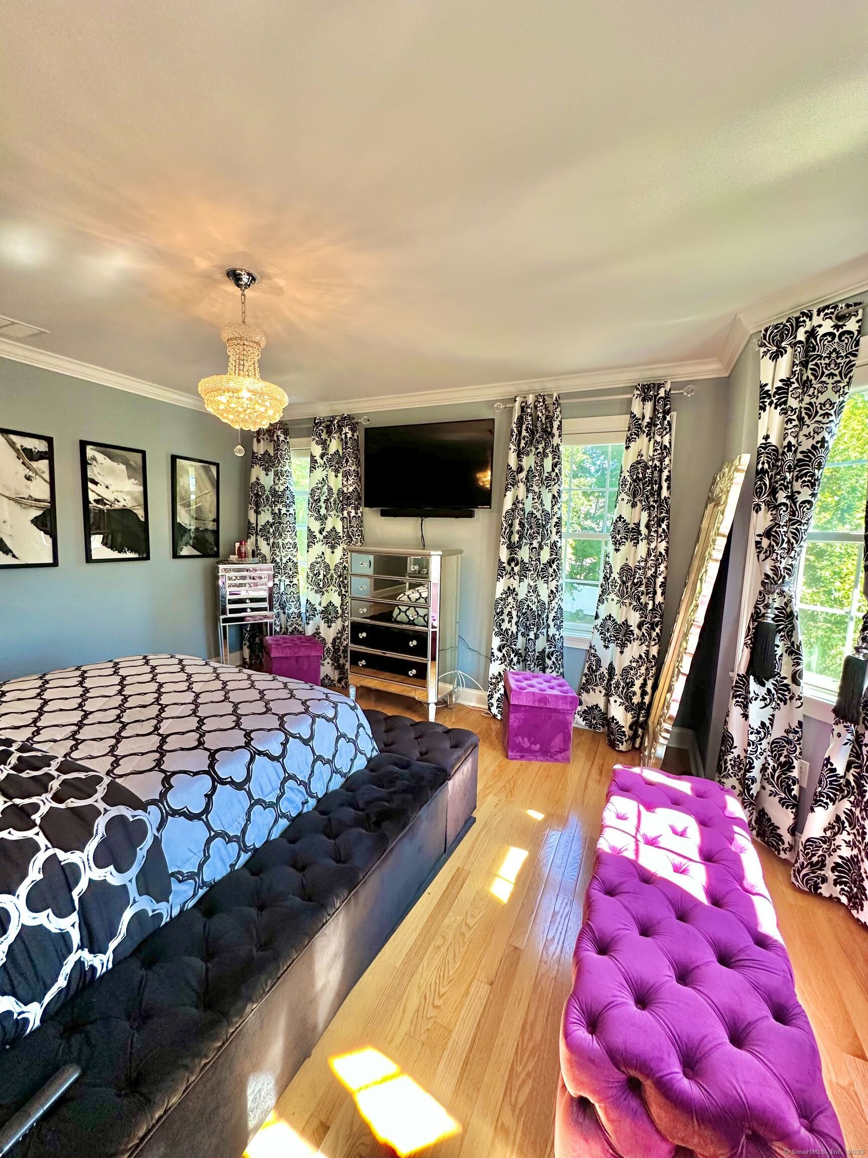 564 Black Rock Turnpike, Unit 564 Fairfield, CT 06825 - Photo 13 of 24 a bedroom with furniture and a flat screen tv