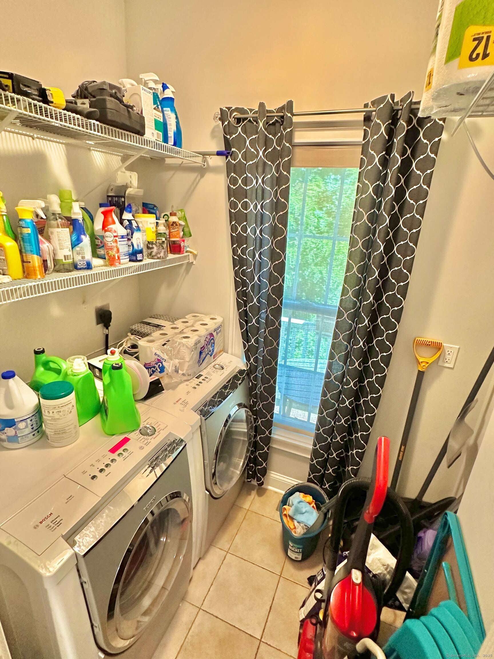 564 Black Rock Turnpike, Unit 564 Fairfield, CT 06825 - Photo 24 of 24 a utility room with dryer and washer