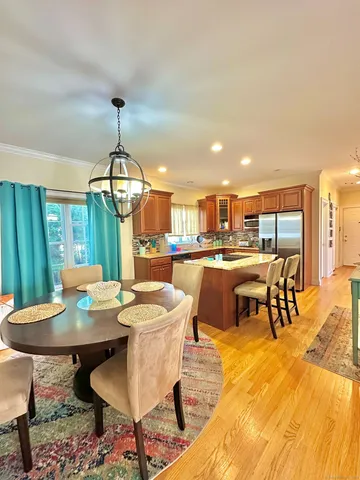 a view of a dining room with furniture