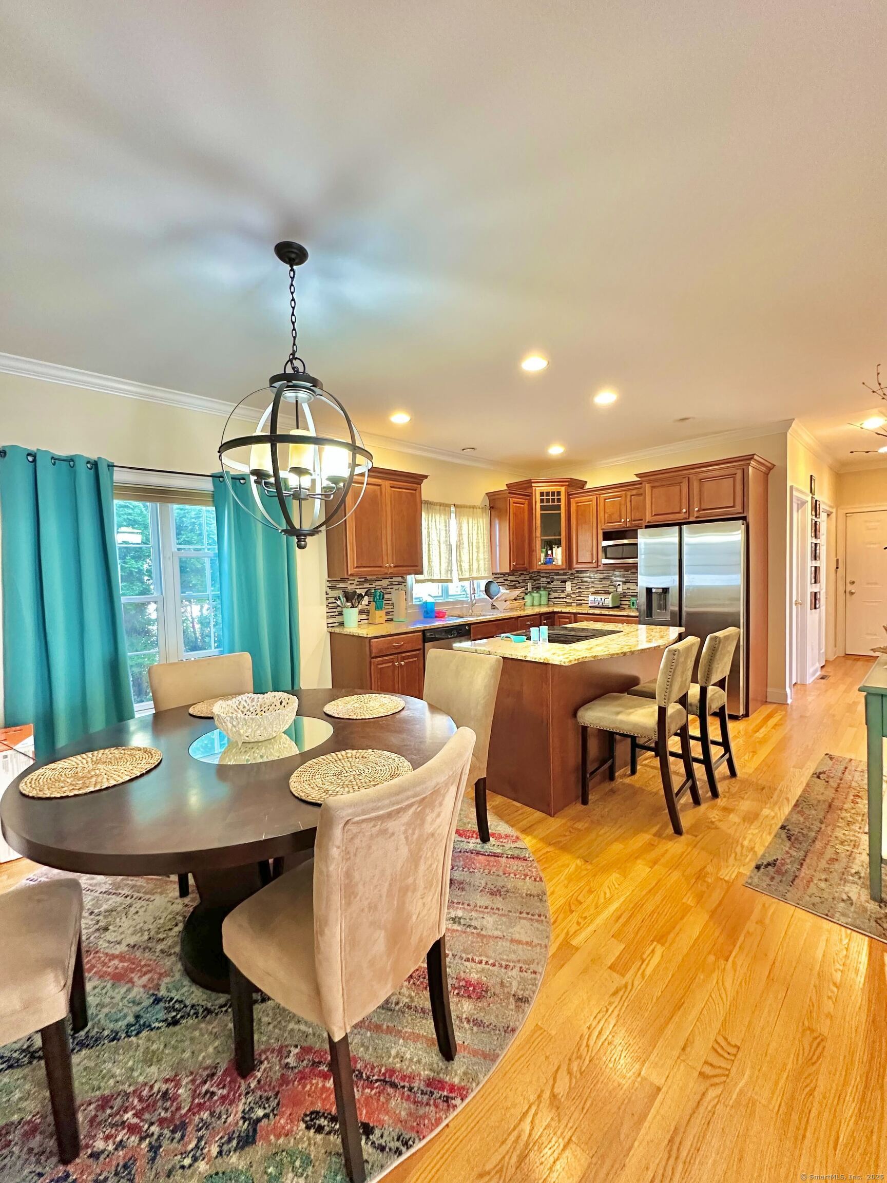 564 Black Rock Turnpike, Unit 564 Fairfield, CT 06825 - Photo 5 of 24 a view of a dining room with furniture