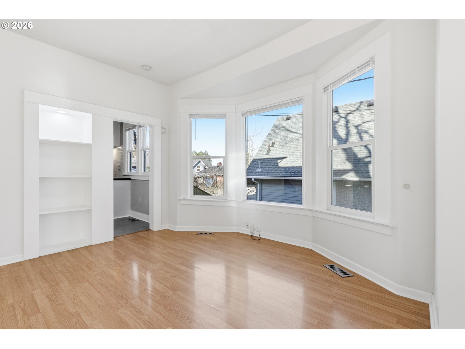 25 Southeast 76th Avenue Portland, OR 97215 - Photo 12 of 48 a view of an empty room with a window