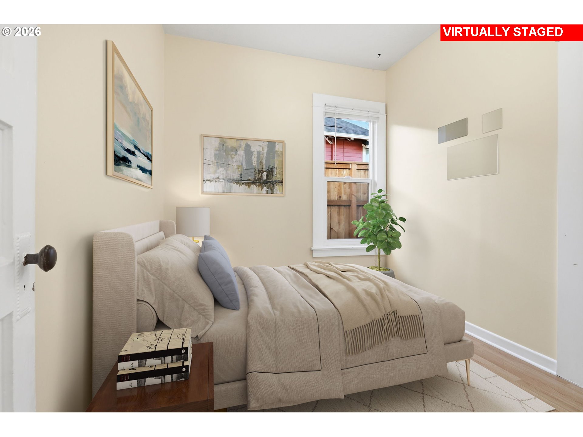 25 Southeast 76th Avenue Portland, OR 97215 - Photo 16 of 48 a bedroom with a bed and a painting on the wall