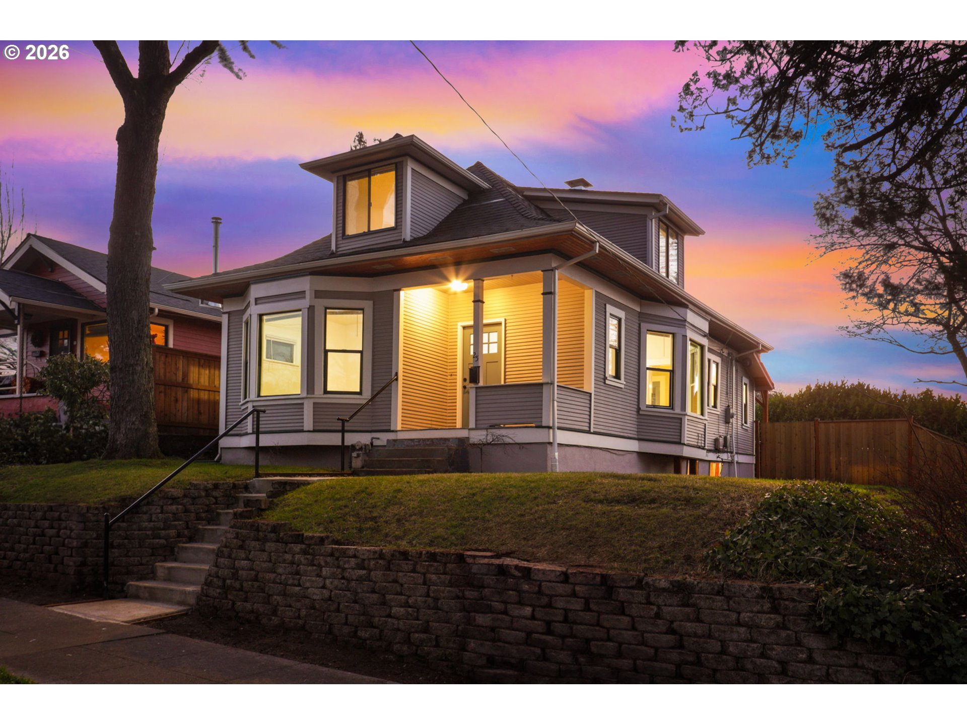 25 Southeast 76th Avenue Portland, OR 97215 - Photo 2 of 48 a front view of a house with a yard