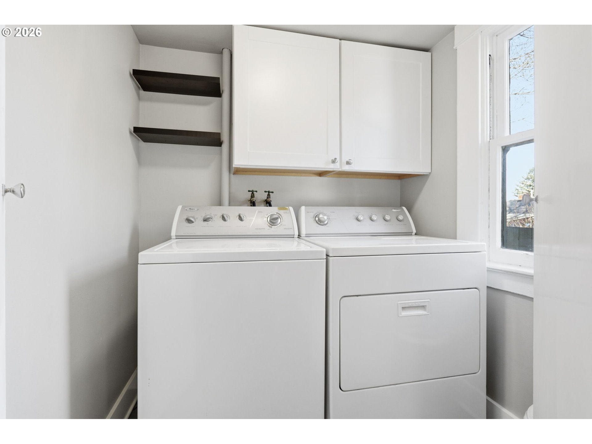 25 Southeast 76th Avenue Portland, OR 97215 - Photo 23 of 48 a utility room with dryer and washer
