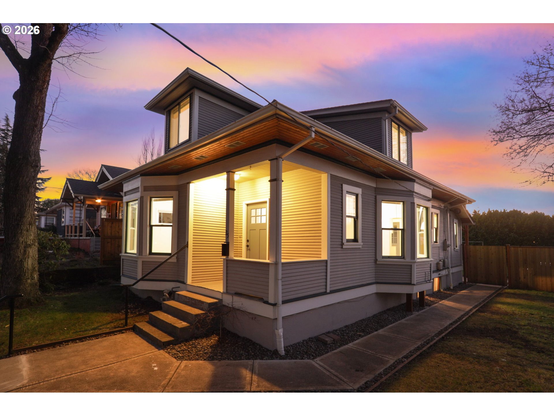25 Southeast 76th Avenue Portland, OR 97215 - Photo 4 of 48 a view of a house with a yard