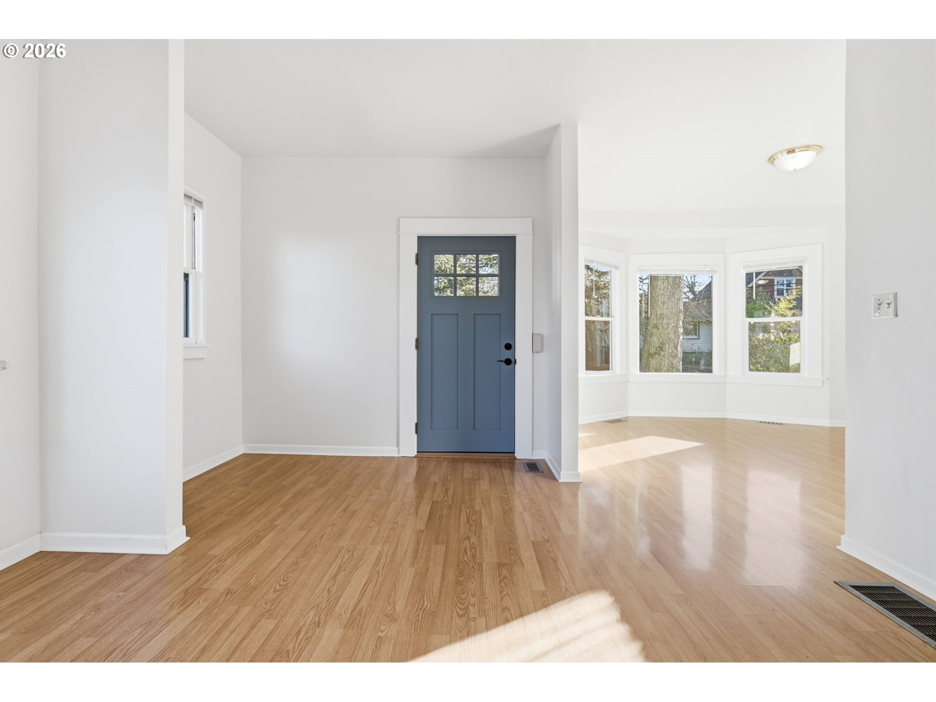 25 Southeast 76th Avenue Portland, OR 97215 - Photo 8 of 48 a view of an empty room with wooden floor