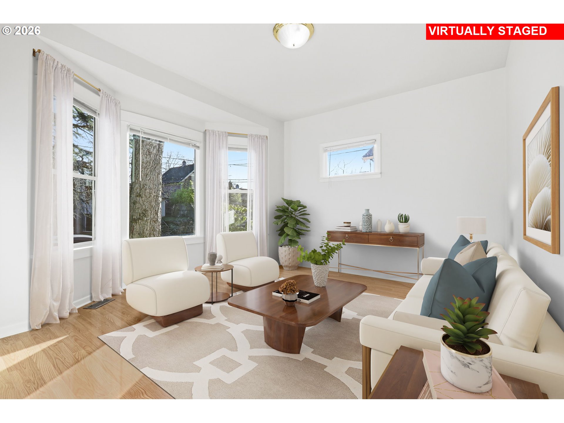 25 Southeast 76th Avenue Portland, OR 97215 - Photo 9 of 48 a living room with furniture and a large window