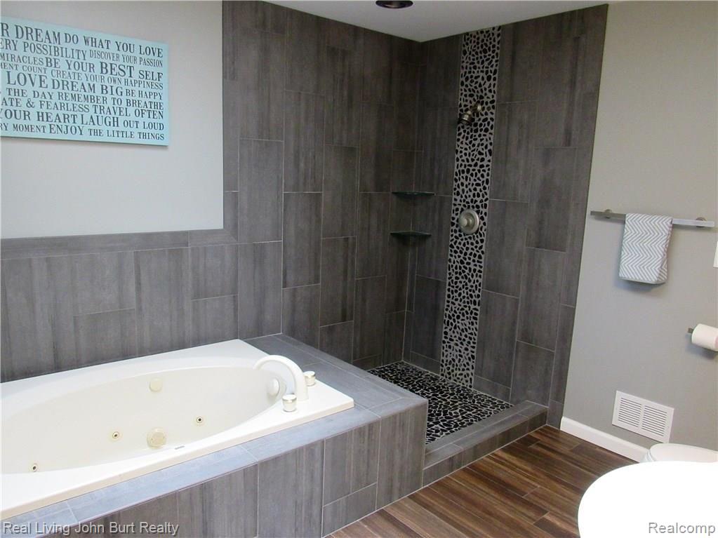 4849 Herd Road Metamora, MI 48455 - Photo 42 of 42 main flr bath w/whirlpool tub and separate shower