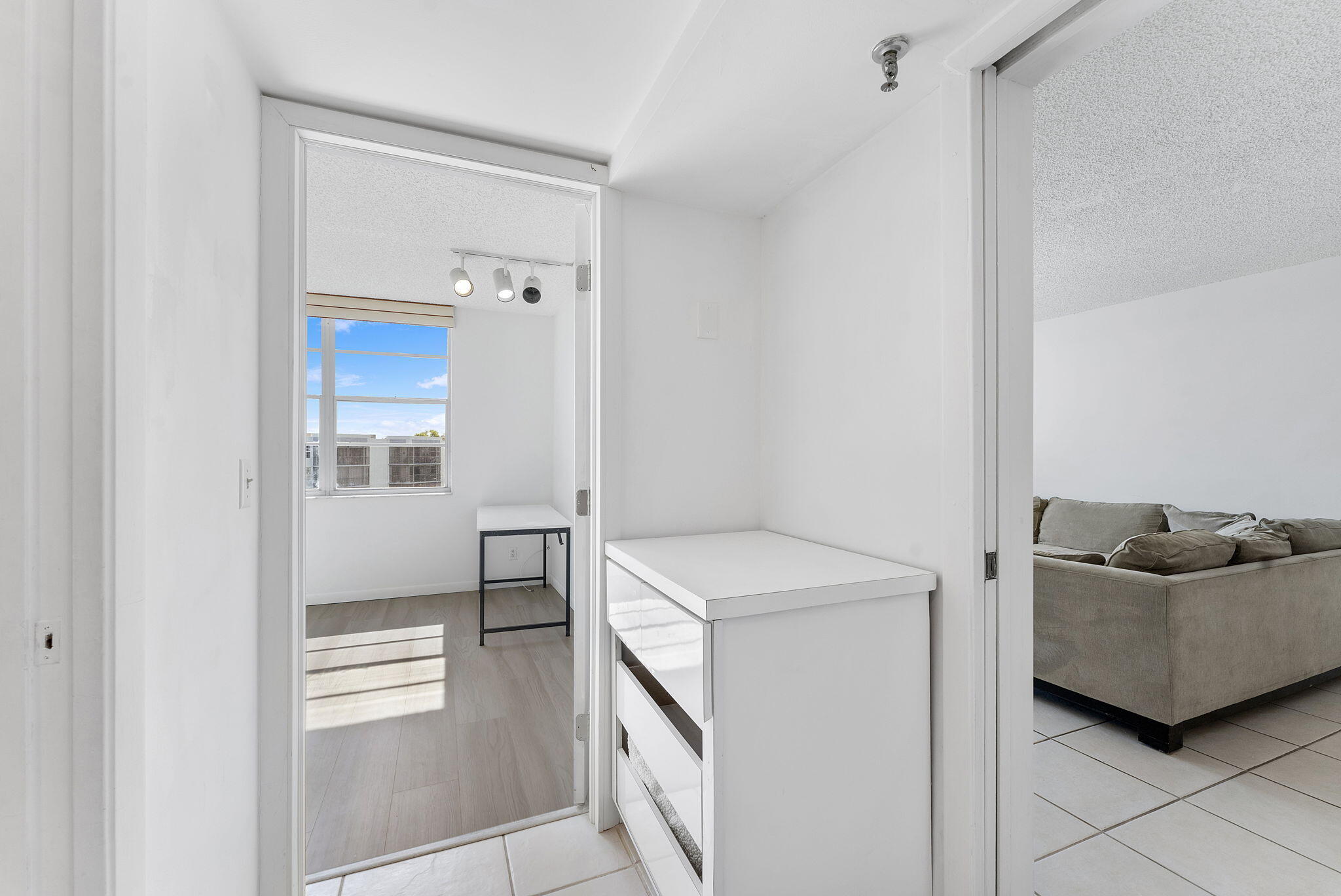 6500 Northwest 2nd Avenue, Unit 511 Boca Raton, FL 33487 - Photo 22 of 28 a utility room with cabinets washer and dryer