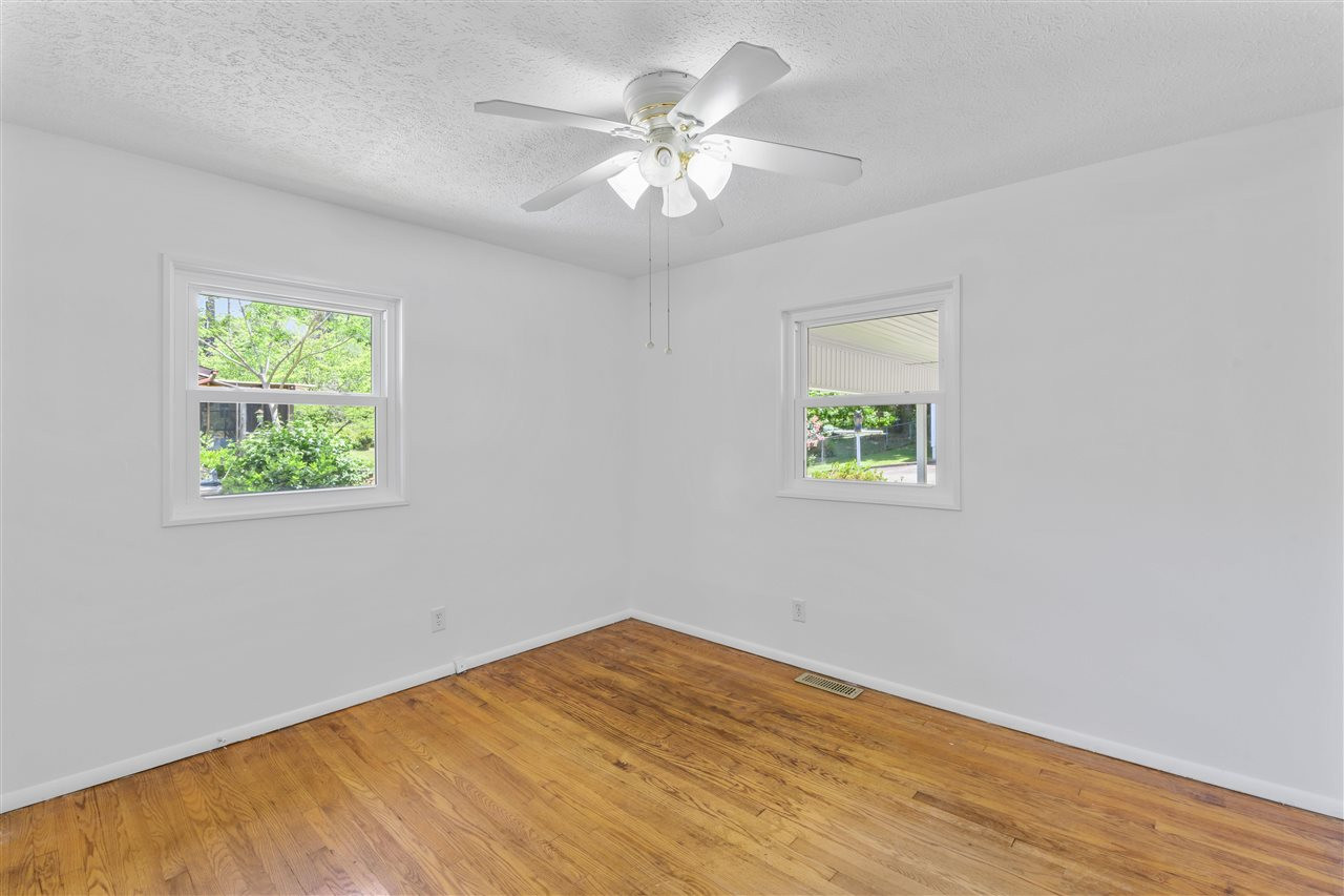 1421 Kelly Road Garner, NC 27529 - Photo 23 of 24 Corner bedroom offers windows positioned for cross ventilation! Bedroom 2