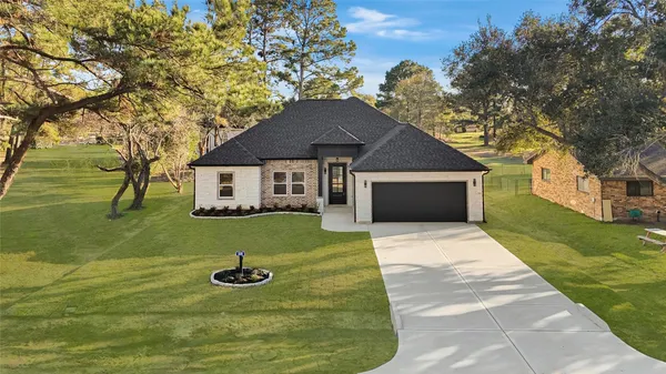 a front view of a house with a glass door