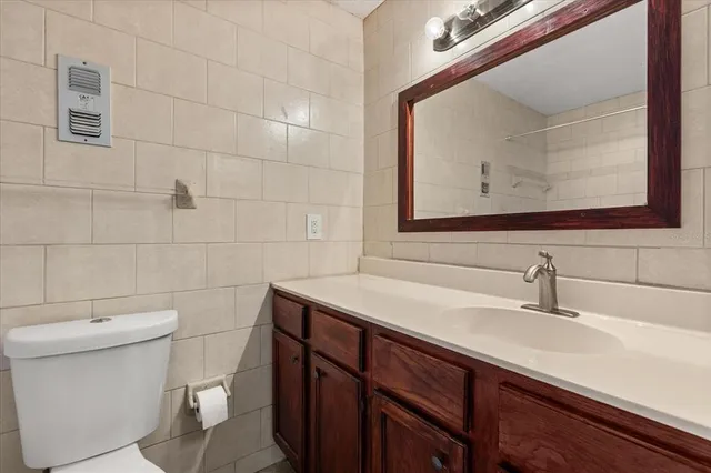 a bathroom with a sink and a toilet