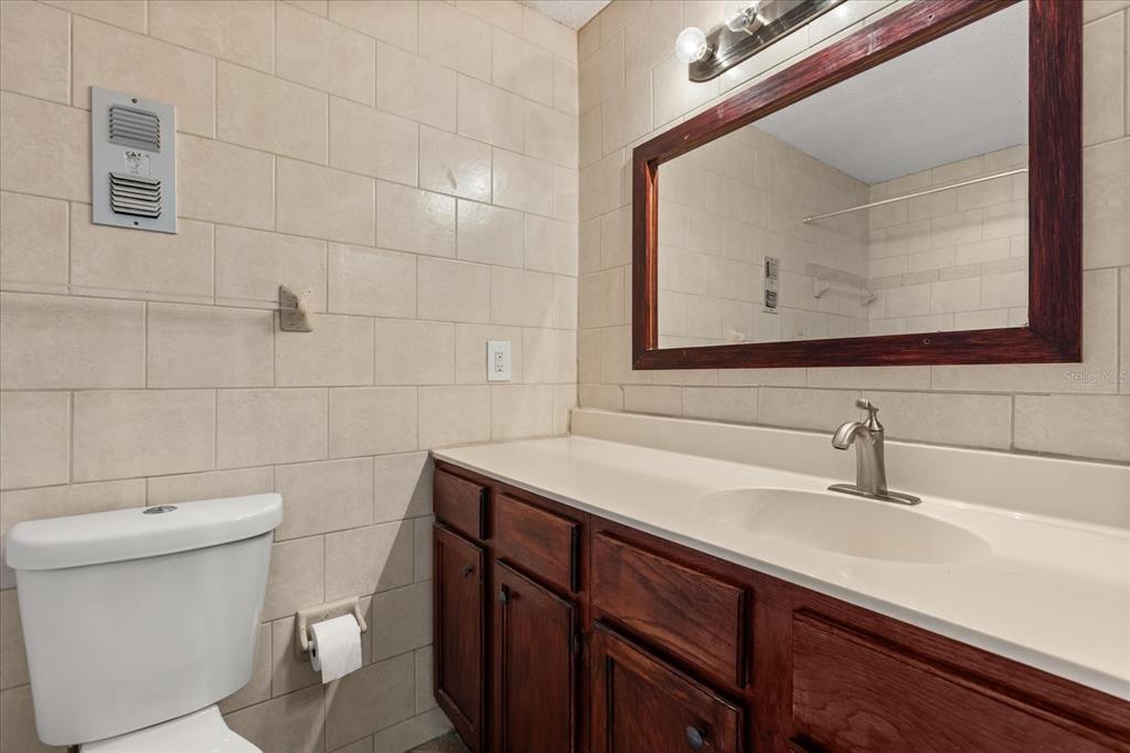512 Orange Drive, Unit 32 Altamonte Springs, FL 32701 - Photo 8 of 16 a bathroom with a sink and a toilet
