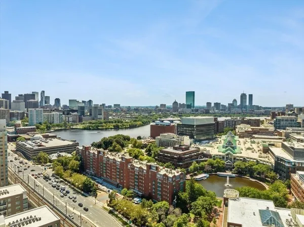 a view of a city with tall buildings