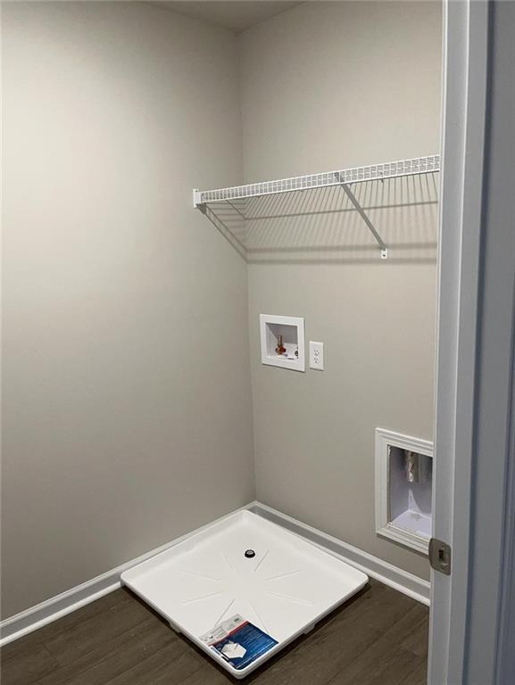 6185 Colston Lane, Unit 7 Tucker, GA 30084 - Photo 15 of 15 an empty room with wooden floor and cabinet