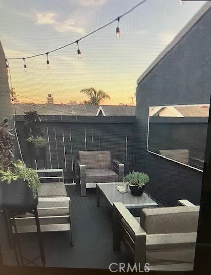 320 12th Street, Unit 5 Seal Beach, CA 90740 - Photo 11 of 18 a view of dining room with furniture