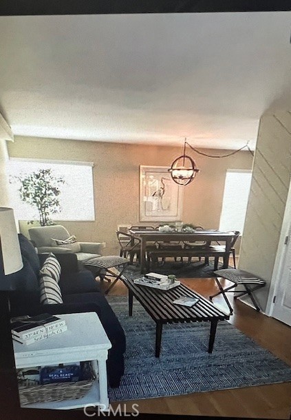 320 12th Street, Unit 5 Seal Beach, CA 90740 - Photo 10 of 18 a living room with furniture rug and window