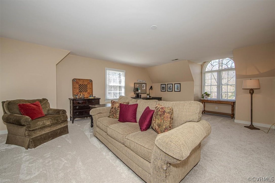 2011 Corner Rock Road Midlothian, VA 23113 - Photo 24 of 34 a living room with furniture and a flat screen tv