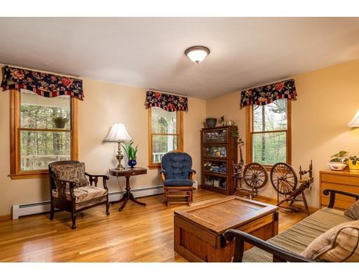 253 Stafford Road Monson, MA 01057 - Photo 8 of 24 a living room with furniture and a large window
