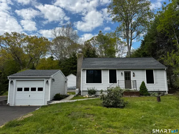 a view of a yard in front of house
