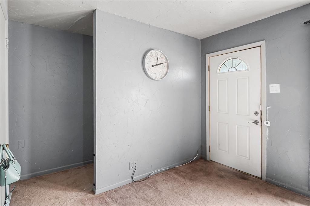 1129 Ridgeview Street Mesquite, TX 75149 - Photo 3 of 14 a view of an empty room with a window
