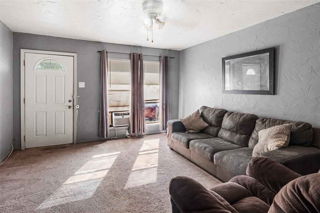 1129 Ridgeview Street Mesquite, TX 75149 - Photo 5 of 14 a living room with furniture and a window