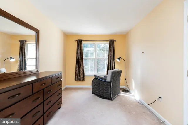 a view of a hallway with staircase