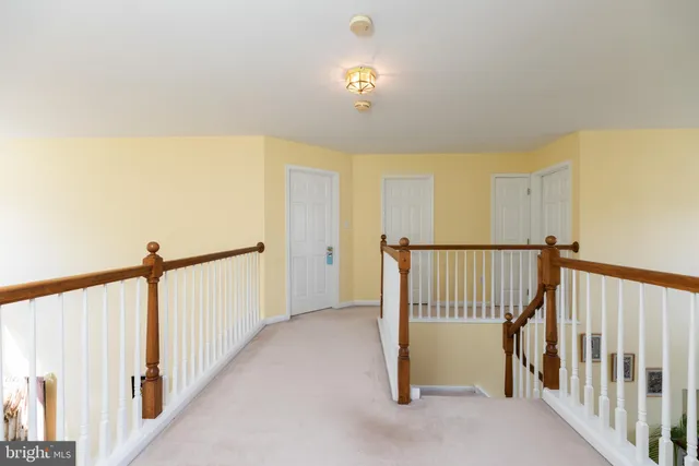 an aerial view of house with yard swimming pool and outdoor seating