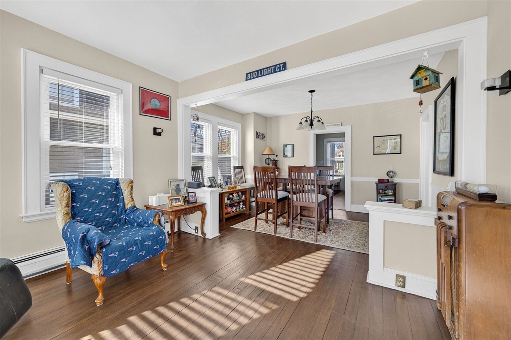 18 Maple Street Fairhaven, MA 02719 - Photo 11 of 39 a living room with furniture and wooden floor