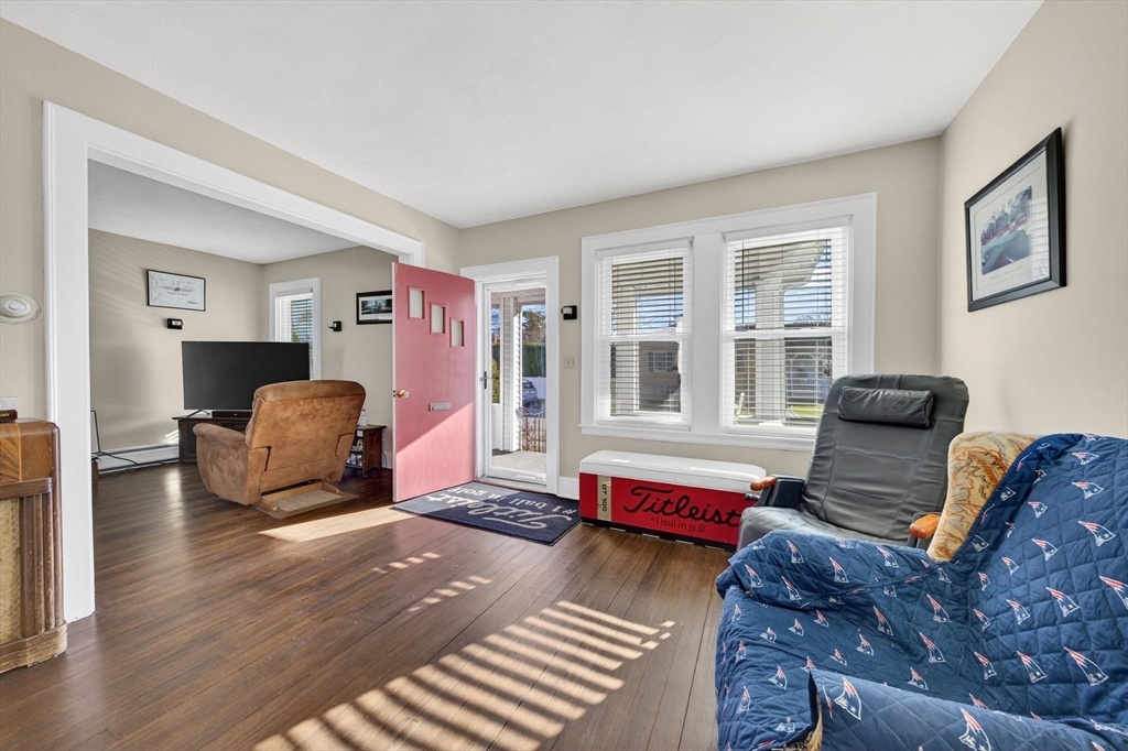 18 Maple Street Fairhaven, MA 02719 - Photo 22 of 39 a bedroom with furniture and a window