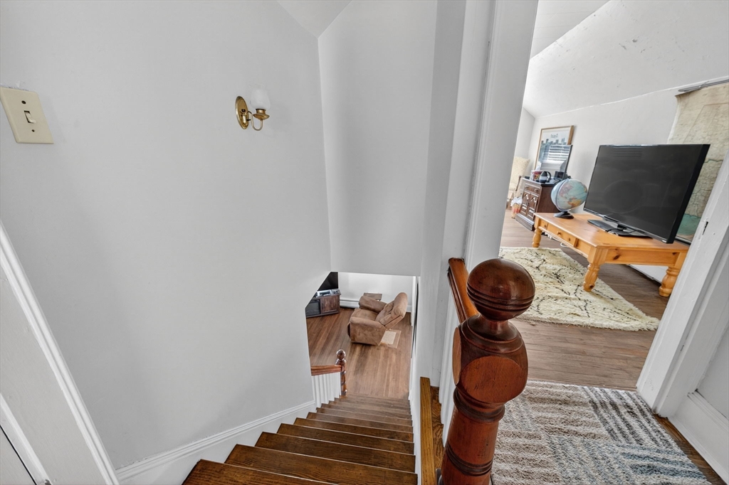 18 Maple Street Fairhaven, MA 02719 - Photo 25 of 39 a living room with furniture and a window