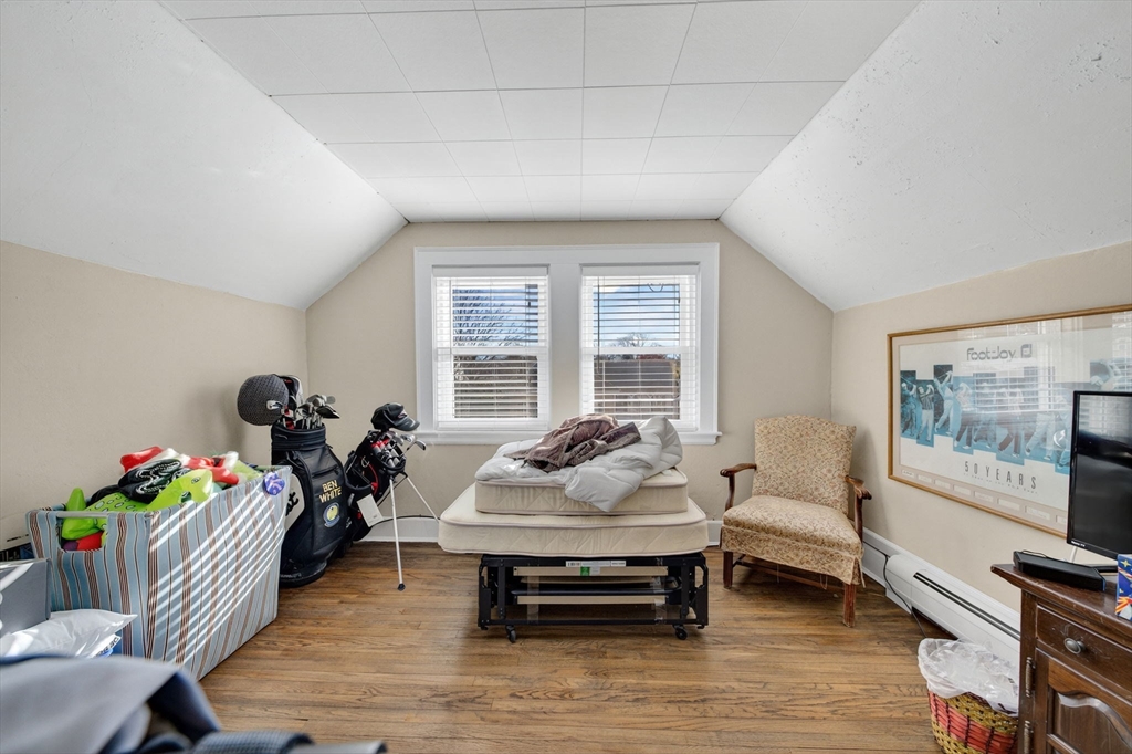 18 Maple Street Fairhaven, MA 02719 - Photo 26 of 39 a living room with furniture and a flat screen tv