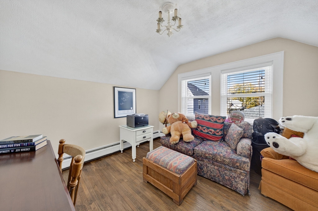 18 Maple Street Fairhaven, MA 02719 - Photo 27 of 39 a living room with furniture and a window