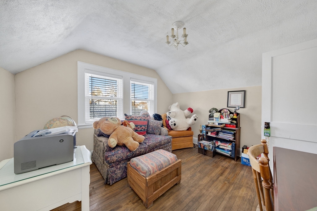 18 Maple Street Fairhaven, MA 02719 - Photo 28 of 39 a living room with furniture and a window