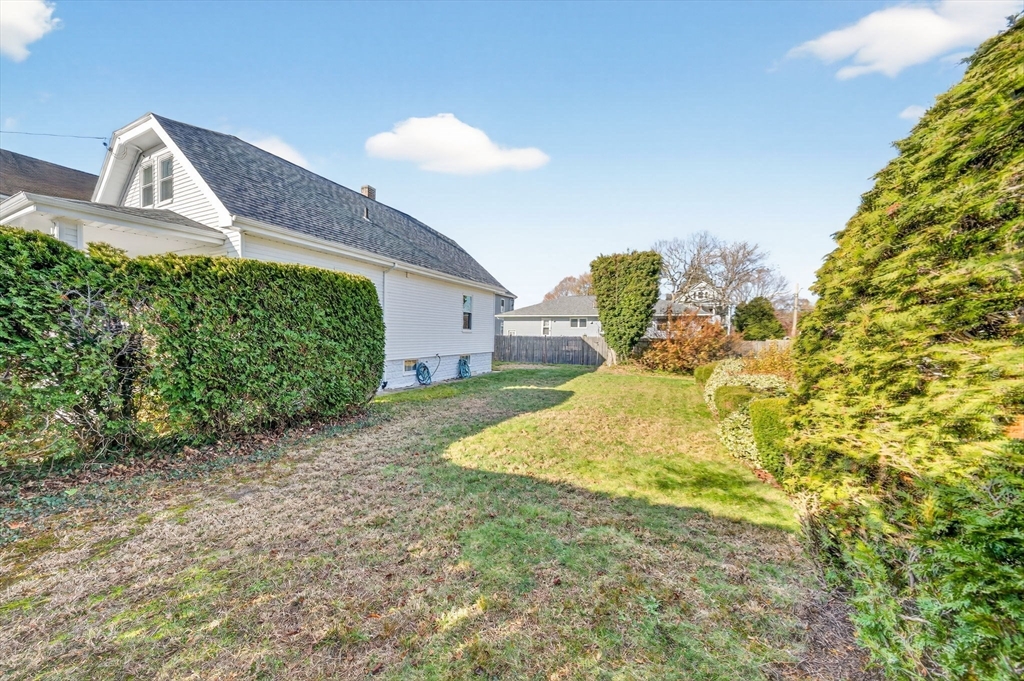 18 Maple Street Fairhaven, MA 02719 - Photo 33 of 39 a front view of a house with a yard