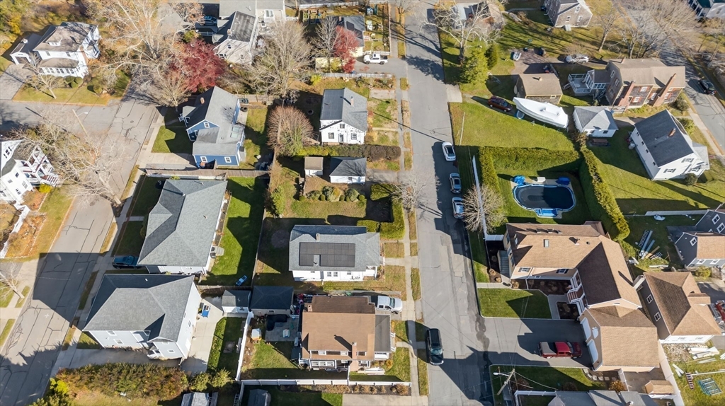 18 Maple Street Fairhaven, MA 02719 - Photo 5 of 39 an aerial view of residential houses with outdoor space