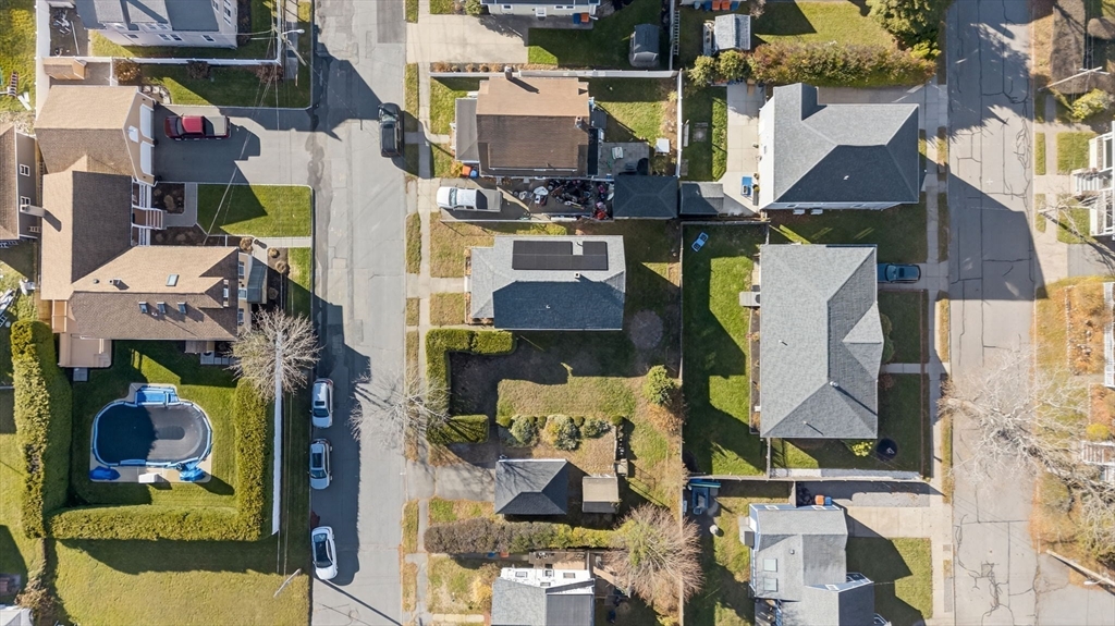 18 Maple Street Fairhaven, MA 02719 - Photo 6 of 39 an aerial view of multi story residential apartment building with yard
