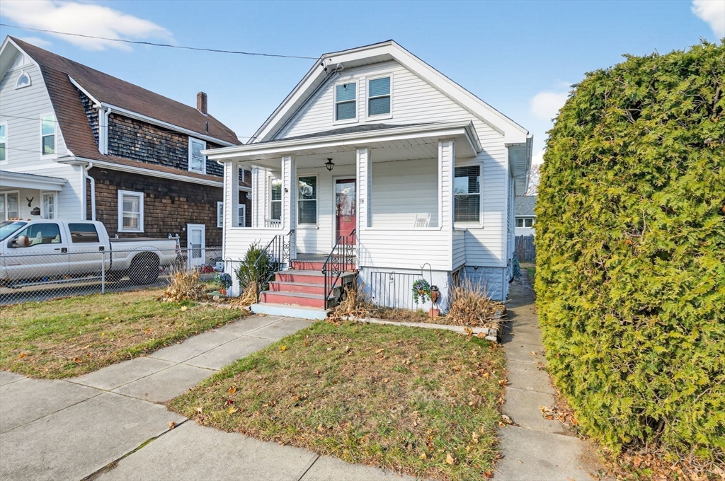 18 Maple Street Fairhaven, MA 02719 - Photo 7 of 39 front view of a house with a yard