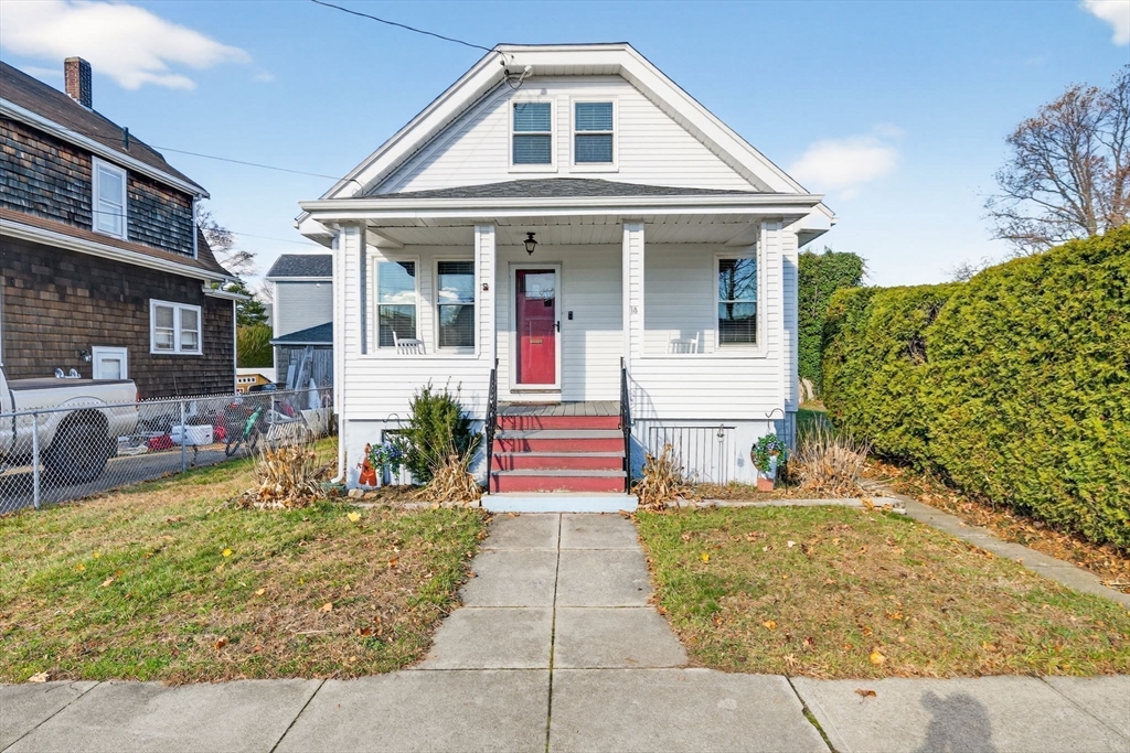18 Maple Street Fairhaven, MA 02719 - Photo 8 of 39 a front view of a house with a yard