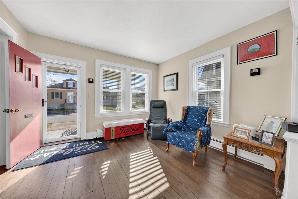 18 Maple Street Fairhaven, MA 02719 - Photo 10 of 39 a living room with furniture and a window