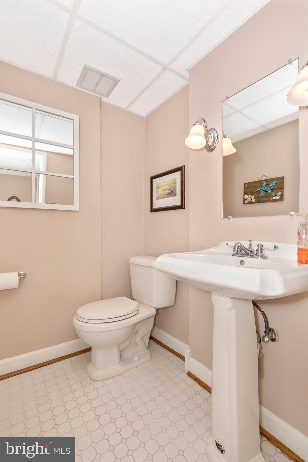 18901 Willow Grove Road Olney, MD 20832 - Photo 20 of 46 A powder rm is well located just off family room