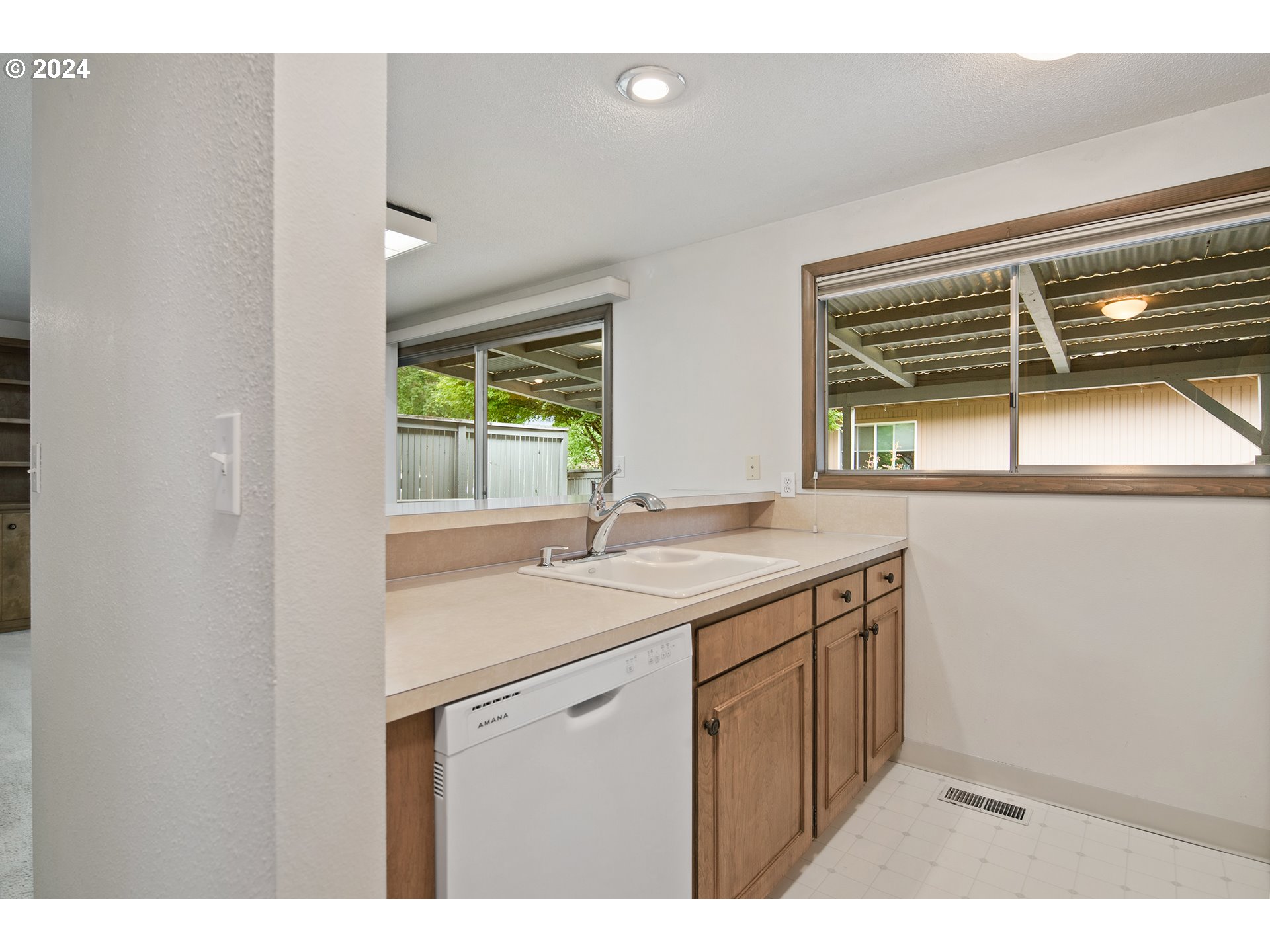 1065 Chestnut Street Northwest Salem, OR 97304 - Photo 19 of 44 a kitchen with a sink and large window