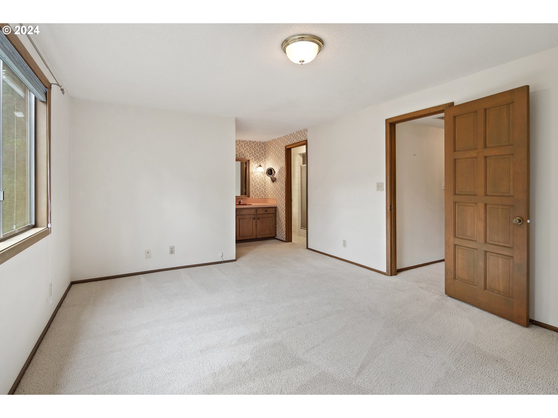 1065 Chestnut Street Northwest Salem, OR 97304 - Photo 23 of 44 a view of an empty room with a window