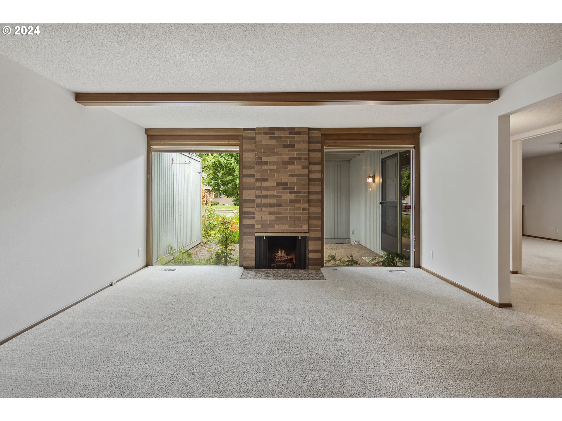 1065 Chestnut Street Northwest Salem, OR 97304 - Photo 7 of 44 a view of empty room with a fireplace