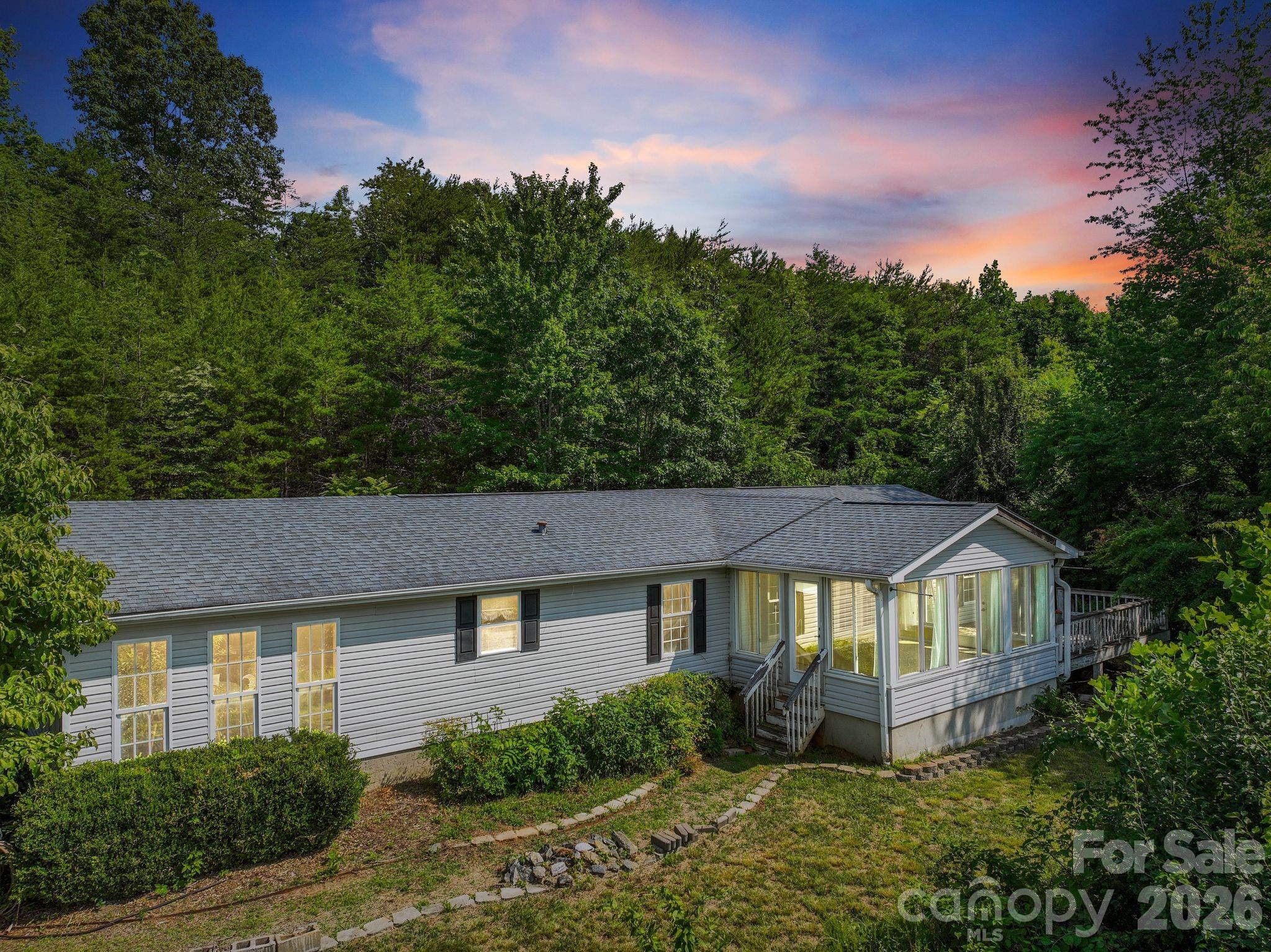 133 Spivey Mountain Road Asheville, NC 28806 - Photo 1 of 40 front view of a house with a yard