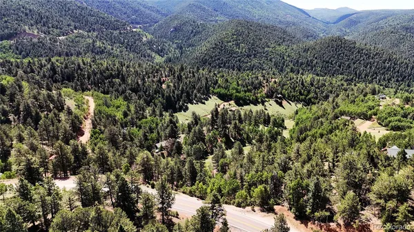 a view of a house with a street