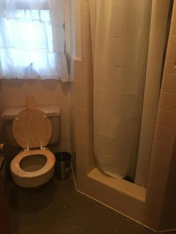 a bathroom with a toilet